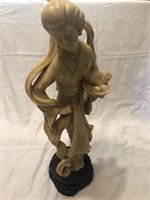 Vintage Asian woman carving with fish possibly