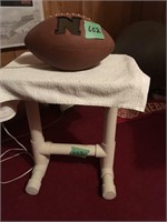 husker lighted football on stand
