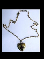 HEART SHAPED LOCKET W/ MOTHER OF PEARL & GARNET