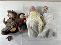 4 antique dolls