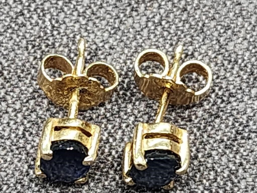 14 K gold earrings with blue stones.   Look at