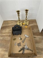 Brass candle sticks , keys and cast iron match