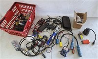 Assortment of multimeters and other tools and