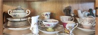 Shelf lot of misc teacups figurines and more