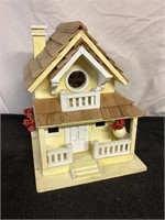 C8) beautiful little birdhouse it stands