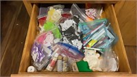 Drawer of assorted craft supplies