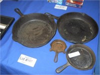 FOUR CAST IRON PANS. ASHTRAY  & 11" ARE GRISWOLD