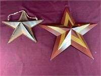 Two Ornate Metal Stars