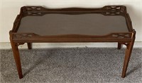 Wood coffee table with glass insert