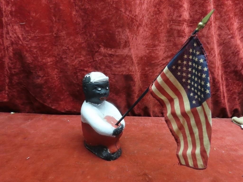 Black americana concrete boy w/flag.