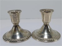 TWO WEIGHTED STERLING CANDLE HOLDERS