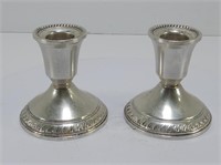 TWO WEIGHTED STERLING CANDLE HOLDERS
