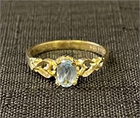 SWEET 10K YELLOW GOLD RING WITH LIGHT BLUE STONE