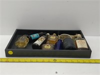 Tray of miniature collector bottles