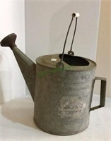 Vintage galvanized watering can marked #10