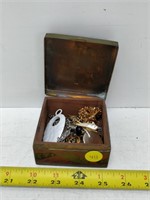 old metal box with jewelry and rings