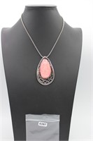 Pink speckled stone pendent