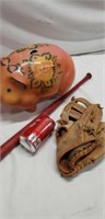 Ceramic piggy bank, Spalding ball glove and toy