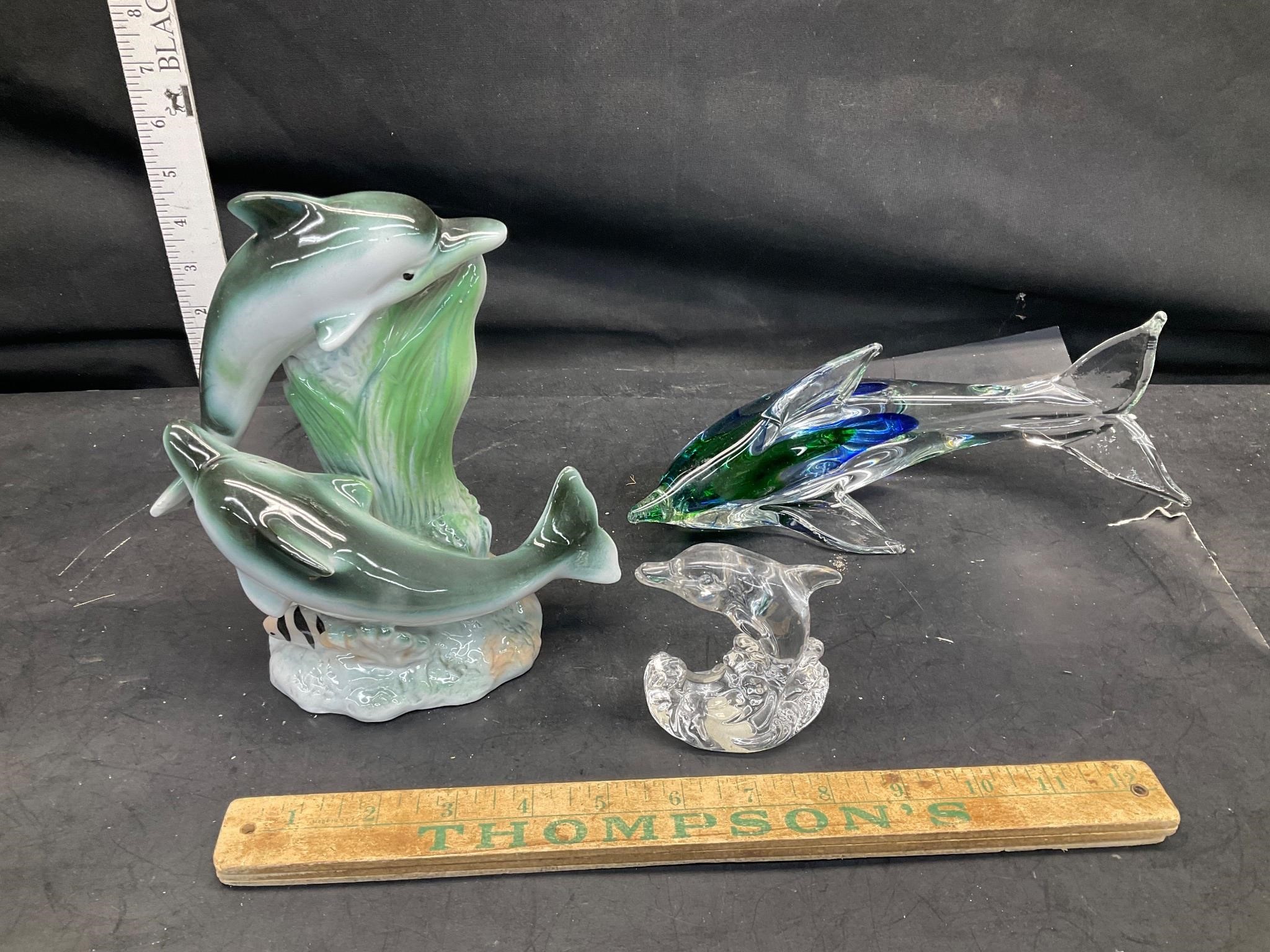 Art glass dolphins