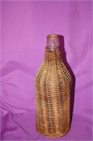 Wicker covered bottle 10.5" hi