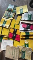 Box of assorted John Deere Manuals
