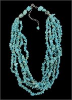 Six-strand 19" turquoise bead necklace with