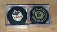 2 Vintage Russian Hockey Pucks in Case