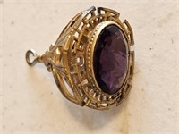 GOLD TYPE NECKLACE PENDTANT W/PURPLE STONE