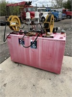 RED OIL TANK W/ PUMPS AND HOSES