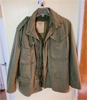Men’s military jacket slightly soiled. Size M.