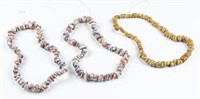 3 Polished stone necklaces.