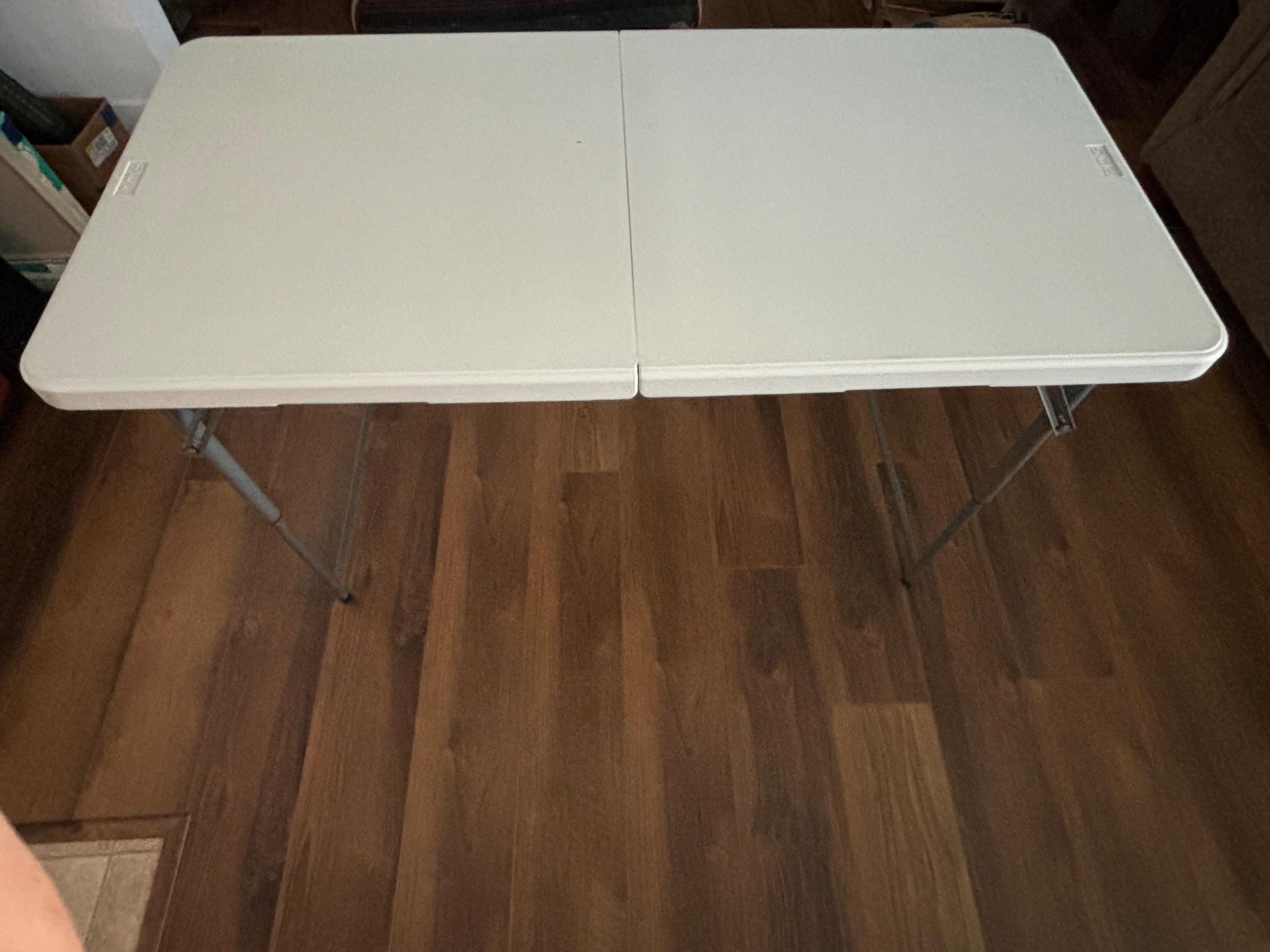 PDG 4’ Adjustable Height Center Fold Table