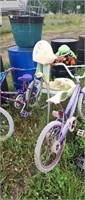 2 girls bikes and baby toy one money