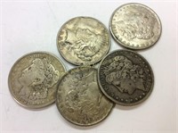 Lot: 5 circulated silver dollars