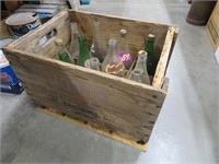 pop bottles and wooden case
