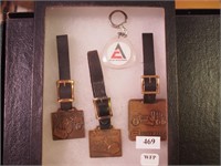 Container of watch fobs: Allis Chalmers and