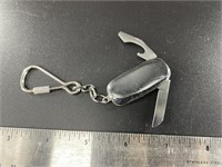 Small hematite pocket knife on key chain with smal