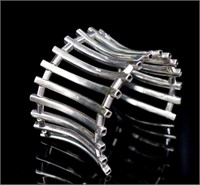 Modernist silver articulated cuff bangle