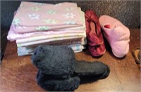 LOT OF PILLOWCASES AND SLIPPERS