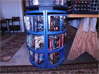 DVD movies & VHS tapes in half round bookcase