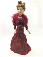 Porcelain Doll w/Red Dress & Feather Boa On Stand