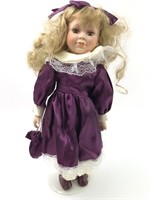 Purple Dress Porcelain Doll On Stand