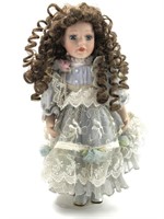 Curly Haired Porcelain Doll On Stand