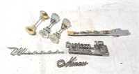 Vintage door knobs and car emblems