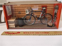 Toy bicycle and wood collector's case scene