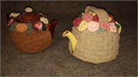 Pair of antique teapots with cozies
