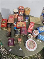 Table full of tin canisters