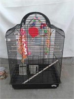 Cage d'oiseaux avec accessoire