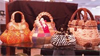 Four art pottery cookie jars in the form of purses