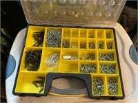 Storage container full of screws, washers etc